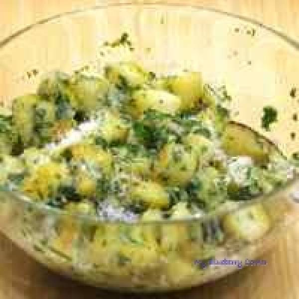 Smażone ziemniaki z masłem ziołowym (pommes persillade)